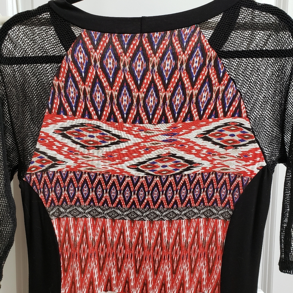 Beautiful figure accentuating dress by Julienne